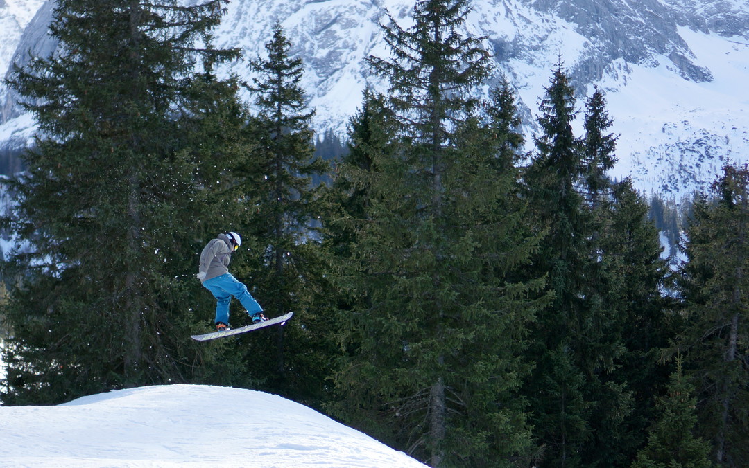 Snowboarder jumping